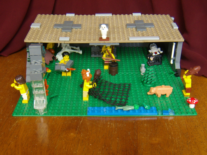 LEGO MOC - Because we can! - Caveman fire discovery: Общий вид работы - поляна перед пещерой древних людей.