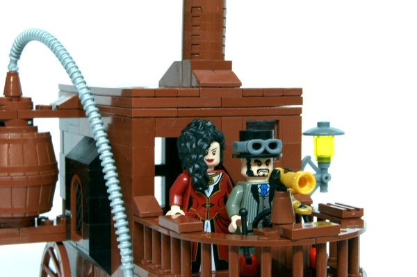 LEGO MOC - Steampunk Machine - Self-propelled carriage: В 'кабине' помещаются две фигурки. Управление производится рулём (штурвал тут смотрится слишком громоздко) и парой рычагов. Помимо этого есть подзорная труба.