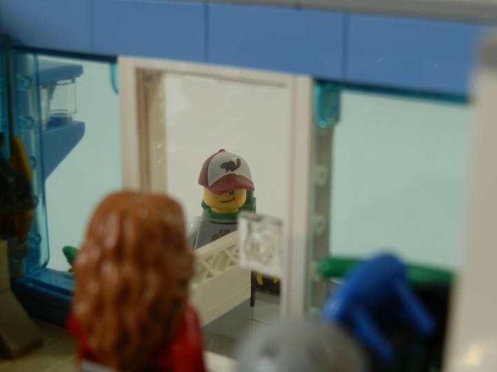 LEGO MOC - New Year's Brick 2014 - Магазин игрушек.: Вот тот самый мальчишка. Замечтался, видимо.