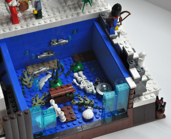 LEGO MOC - New Year's Brick 2014 - Christmas Tree Festival: Интересно, а что под льдом, который сковывает речку?<br />
А рыбы тут не видимо, и от каждой идут пузырьки.. Ух-ты, да тут кроме рыбы и сундук на дне стоит... и наверно битком набитый сокровищами.. а сундук охраняет воин-скелет.... ну это уже совсем другая история. 