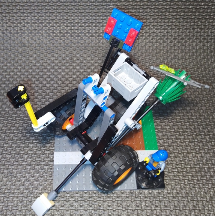 LEGO MOC - LEGO-конкурс 16x16: 'Все работы хороши' - Управляющий роботом-дворником: Функции робота-дворника: подметает улицы и следит за чистотой двора, капает ямы (например, для посадки деревьев или установки конструкций детского городка), соскребает с дорог лёд, срубает старые деревья и кустарники, чистит дороги, очищает газон от листвы и т.п.